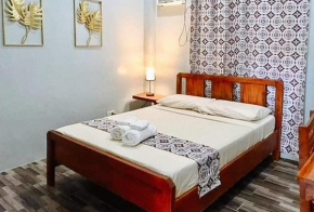 RedDoorz at Gracia's Calzada Inn Camiguin